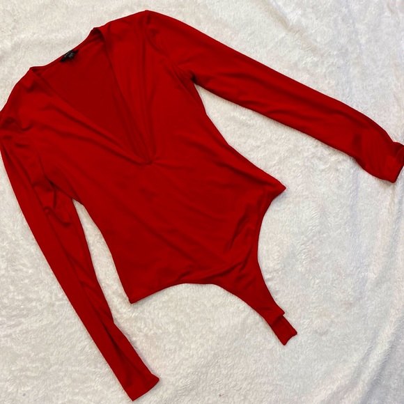 Dark red low cut body suit. - Picture 1 of 3